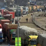 Trucks parked on Peshawar-Torkhum border highway as cross-border movement was completely stopped with Afghanistan after a series of terror attacks in Pakistan.